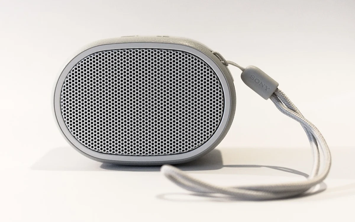 Linha JBL Bluetooth — comparativo por tamanho e potência Linha de caixas de som JBL portáteis Bluetooth dispostas por tamanho, da menor à maior