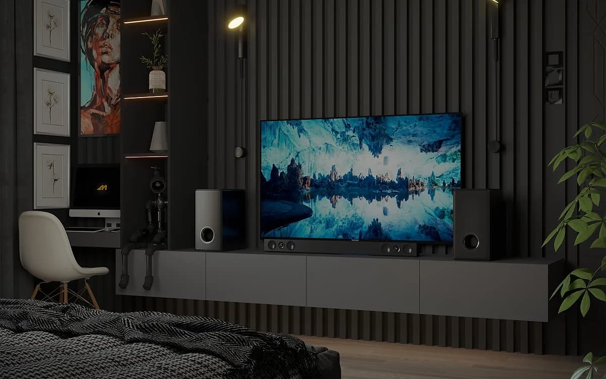 Soundbar com Dolby Atmos em 2026 — Top 4 Modelos Soundbar Samsung com drivers up-firing posicionado abaixo de TV em sala de estar com iluminação ambiente