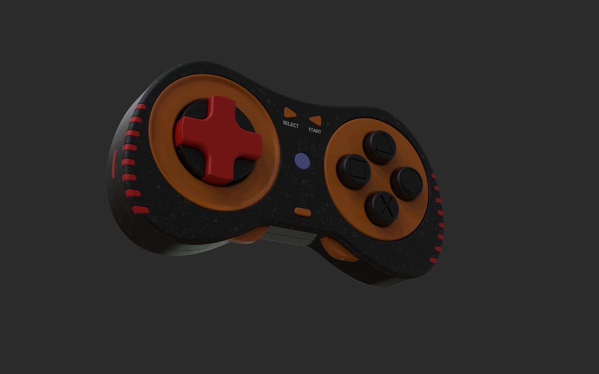 Controle de videogame estiloso para emuladores Android Controle de videogame preto e laranja com botões vermelhos para jogos Android.