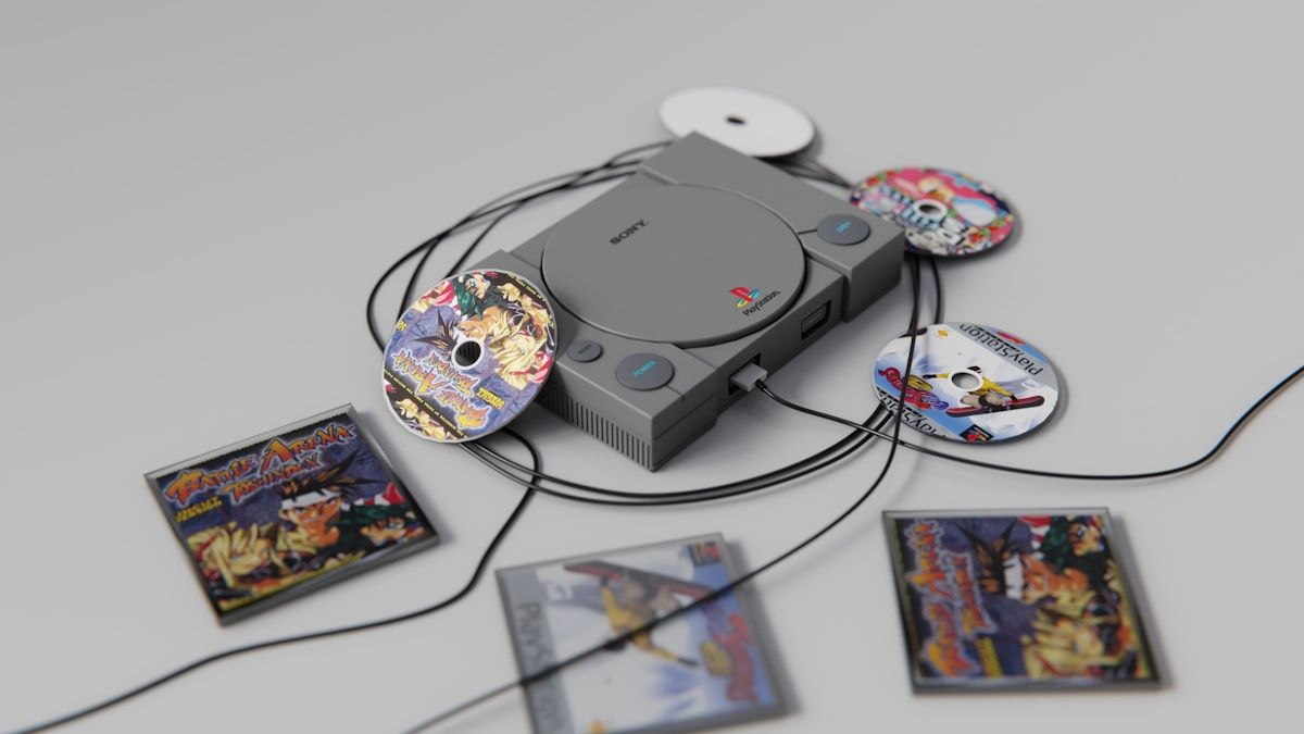 Console de videogame e CDs para jogos da Riot Games Console de videogame cercado por CDs e discos, ideal para jogos da Riot Games